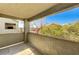 Outdoor patio with views of greenery and surrounding neighborhood buildings at 555 E Silverado Ranch Blvd # 2086, Las Vegas, NV 89183