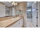 Bathroom features a vanity, tiled flooring, and a shower/tub combo at 61 Contrada Fiore Dr, Henderson, NV 89011