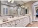 Bathroom with double vanity and large glass shower at 61 Contrada Fiore Dr, Henderson, NV 89011