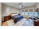 Main bedroom with hardwood floors and access to backyard at 61 Contrada Fiore Dr, Henderson, NV 89011