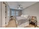 Spacious bedroom with king-size bed, ceiling fan and plantation shutters at 61 Contrada Fiore Dr, Henderson, NV 89011