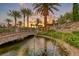 Gated entrance to Bella Fiore community, featuring a stone bridge and water feature at 61 Contrada Fiore Dr, Henderson, NV 89011