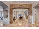 Formal dining room with stone archways and chandelier at 61 Contrada Fiore Dr, Henderson, NV 89011