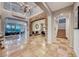 Grand entryway with high ceilings, stone accents, and chandelier at 61 Contrada Fiore Dr, Henderson, NV 89011