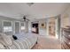 Main bedroom with plush carpeting and access to the balcony at 61 Contrada Fiore Dr, Henderson, NV 89011