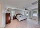 Spacious main bedroom with a king-size bed and private access at 61 Contrada Fiore Dr, Henderson, NV 89011