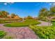 Community putting green with brick pathway at 61 Contrada Fiore Dr, Henderson, NV 89011