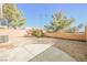 Small backyard with gravel and a concrete patio area at 7332 Marble Lake St # 103, Las Vegas, NV 89149