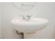 Clean bathroom with pedestal sink at 7332 Marble Lake St # 103, Las Vegas, NV 89149