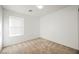 Bright bedroom with window and neutral carpet at 7332 Marble Lake St # 103, Las Vegas, NV 89149