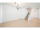 Dining area with tile floors and staircase at 7332 Marble Lake St # 103, Las Vegas, NV 89149