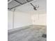 Attached garage with automatic door opener and overhead storage at 7332 Marble Lake St # 103, Las Vegas, NV 89149