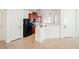 Kitchen with breakfast bar and open dining area with tile floors at 7332 Marble Lake St # 103, Las Vegas, NV 89149