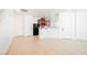 Open floor plan with kitchen and living area, featuring tile floors at 7332 Marble Lake St # 103, Las Vegas, NV 89149