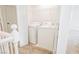 Convenient upper-level laundry with washer and dryer at 7332 Marble Lake St # 103, Las Vegas, NV 89149