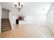 Spacious living room with tile floors and open concept at 7332 Marble Lake St # 103, Las Vegas, NV 89149