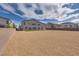 Spacious backyard with artificial turf and gravel at 8541 S Pioneer Way, Las Vegas, NV 89113