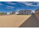 Large backyard with gravel and artificial turf at 8541 S Pioneer Way, Las Vegas, NV 89113