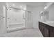 Elegant bathroom with double vanity and large shower at 8541 S Pioneer Way, Las Vegas, NV 89113
