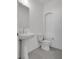 Simple bathroom with pedestal sink and toilet at 8541 S Pioneer Way, Las Vegas, NV 89113