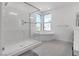 Modern bathroom with soaking tub and walk-in shower at 8541 S Pioneer Way, Las Vegas, NV 89113
