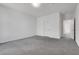 Spacious bedroom with a door to hallway at 8541 S Pioneer Way, Las Vegas, NV 89113