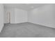 Spacious bedroom with grey carpet and neutral walls at 8541 S Pioneer Way, Las Vegas, NV 89113