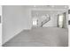 Bright and airy entryway with view to spacious living area and staircase at 8541 S Pioneer Way, Las Vegas, NV 89113