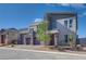 Contemporary two-story home with stone accents and three-car garage at 8541 S Pioneer Way, Las Vegas, NV 89113