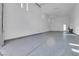 Large garage with high ceilings and extra storage at 8541 S Pioneer Way, Las Vegas, NV 89113