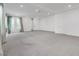 Open living room with high ceilings and neutral tones at 8541 S Pioneer Way, Las Vegas, NV 89113