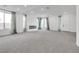 Spacious living area with fireplace and lots of natural light at 8541 S Pioneer Way, Las Vegas, NV 89113