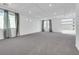 Open living area with high ceilings and neutral decor at 8541 S Pioneer Way, Las Vegas, NV 89113