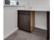 Small wet bar with sink and dark wood cabinets at 8541 S Pioneer Way, Las Vegas, NV 89113