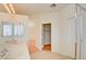 Double vanity bathroom with a shower and access to a bedroom and closet at 8557 Nature Scene Dr, Las Vegas, NV 89139