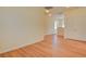 Bright bedroom featuring wood flooring and neutral walls at 8557 Nature Scene Dr, Las Vegas, NV 89139
