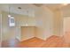 Upstairs hallway with wood flooring and linen closet at 8557 Nature Scene Dr, Las Vegas, NV 89139