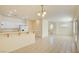 Kitchen with white cabinets and breakfast bar at 8557 Nature Scene Dr, Las Vegas, NV 89139
