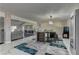 Open dining area with a modern table, stylish chairs, and seamless flow to the living space at 8880 W Ann Rd, Las Vegas, NV 89149