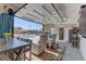 Stylish pool house with modern design, featuring an entertainment area, seating, and outdoor access at 8880 W Ann Rd, Las Vegas, NV 89149