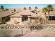 Desert home featuring desert landscaping, and a backyard patio at 1428 Chaparral Dr, Mesquite, NV 89027