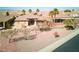 Desert home featuring desert landscaping, and a backyard patio at 1428 Chaparral Dr, Mesquite, NV 89027