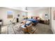 Large bedroom with seating area, exercise bike, and generous natural light at 1428 Chaparral Dr, Mesquite, NV 89027