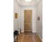 A charming entryway featuring tile flooring, neutral walls, and decorative wall art at 1428 Chaparral Dr, Mesquite, NV 89027