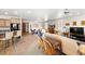 Open-concept living area featuring a breakfast bar, multiple seating areas, and ample natural light at 1428 Chaparral Dr, Mesquite, NV 89027