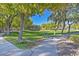 Park with a grassy area, trees, and a bench at 176 Mirador St, Henderson, NV 89074