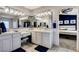 Modern bathroom features double sinks, lots of lighting, vanity area and neutral paint at 190 Mount Saint Helens Dr, Henderson, NV 89012