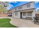 Backyard view of the home's rear exterior with a patio and lawn at 190 Mount Saint Helens Dr, Henderson, NV 89012