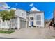 Beautiful home exterior features an attached garage, concrete driveway and well-maintained landscaping at 190 Mount Saint Helens Dr, Henderson, NV 89012