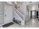 Welcoming home foyer features tile flooring, staircase and view into other parts of the home at 190 Mount Saint Helens Dr, Henderson, NV 89012